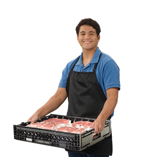 Man carrying meat in a reusable crate.